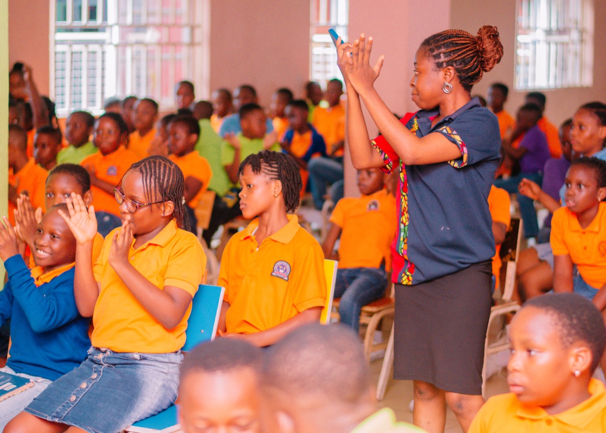 Students gathered in the assembly hall during an engaging session