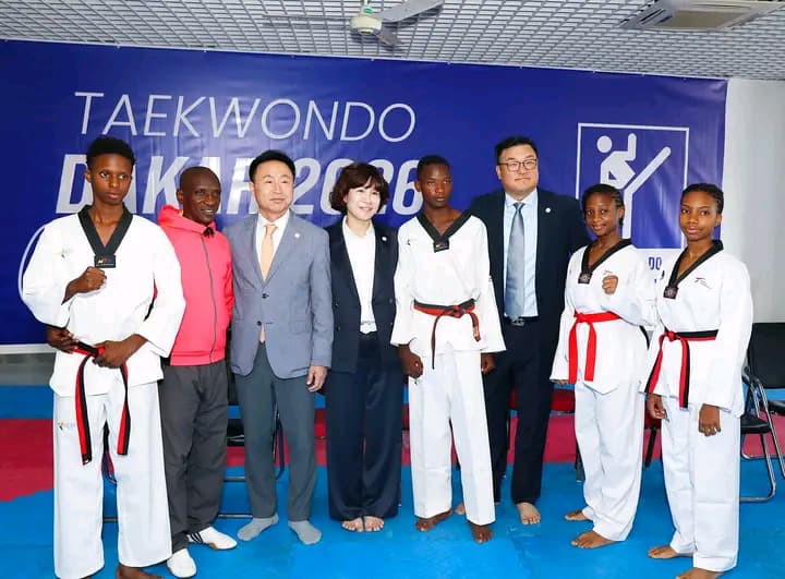 David Iniobong with officials at Taekwondo Dakar 2026 Youth Olympic Games
